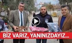Ödemişli öğrencilere bot ve mont yardımı