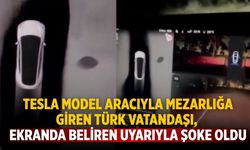 Tesla model aracıyla mezarlığa giren Türk vatandaşı, ekranda beliren uyarıyla şoke oldu