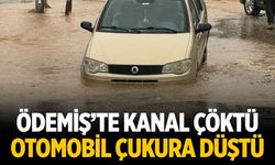 ÖDEMİŞ’TE KANAL ÇÖKTÜ OTOMOBİL ÇUKURA DÜŞTÜ